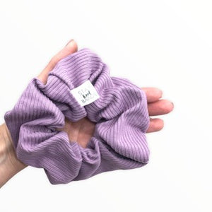 wide scrunchie purple knit in hand