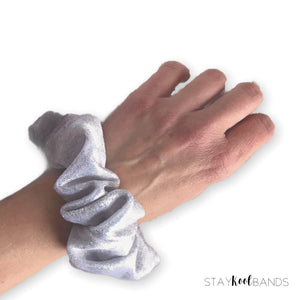 silver sparkle scrunchie on wrist